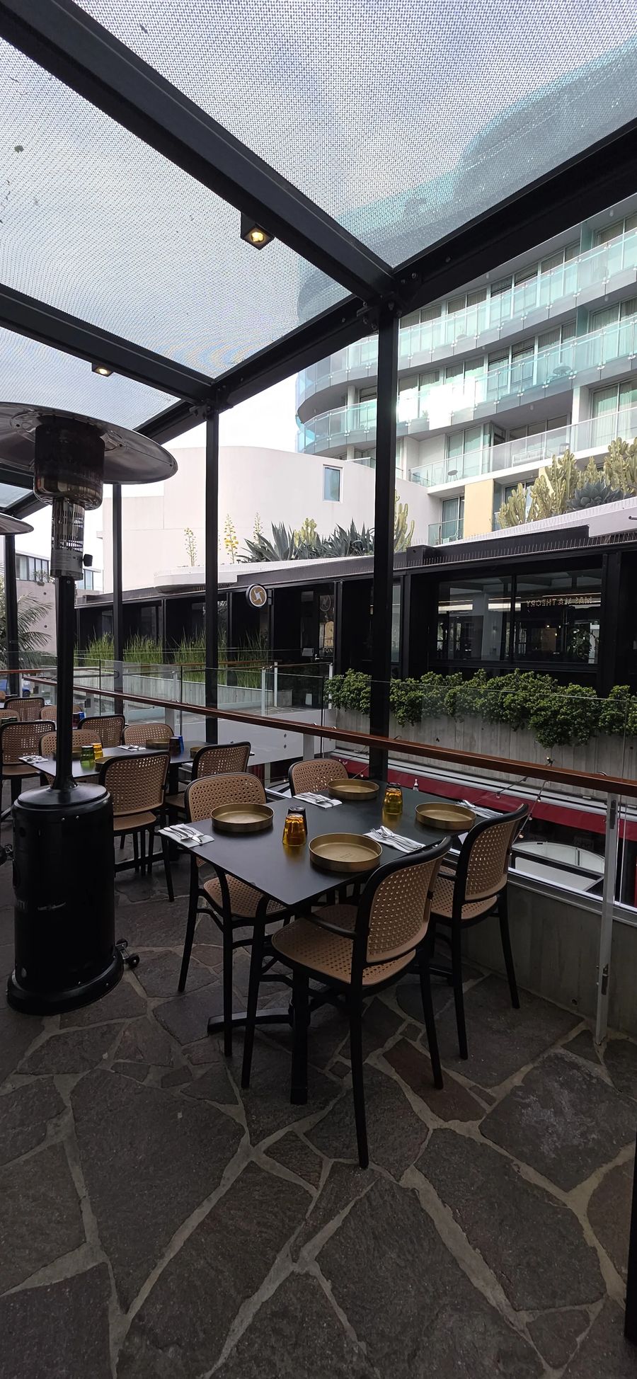 Outdoor dining under glass